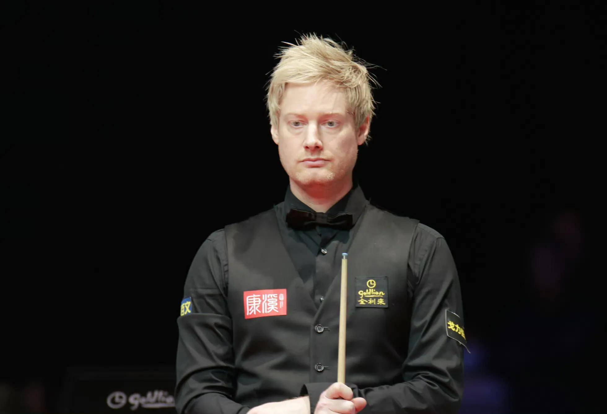 Neil Robertson (Neil Robertson defeated Trump in 52 to advance to the top 8)
